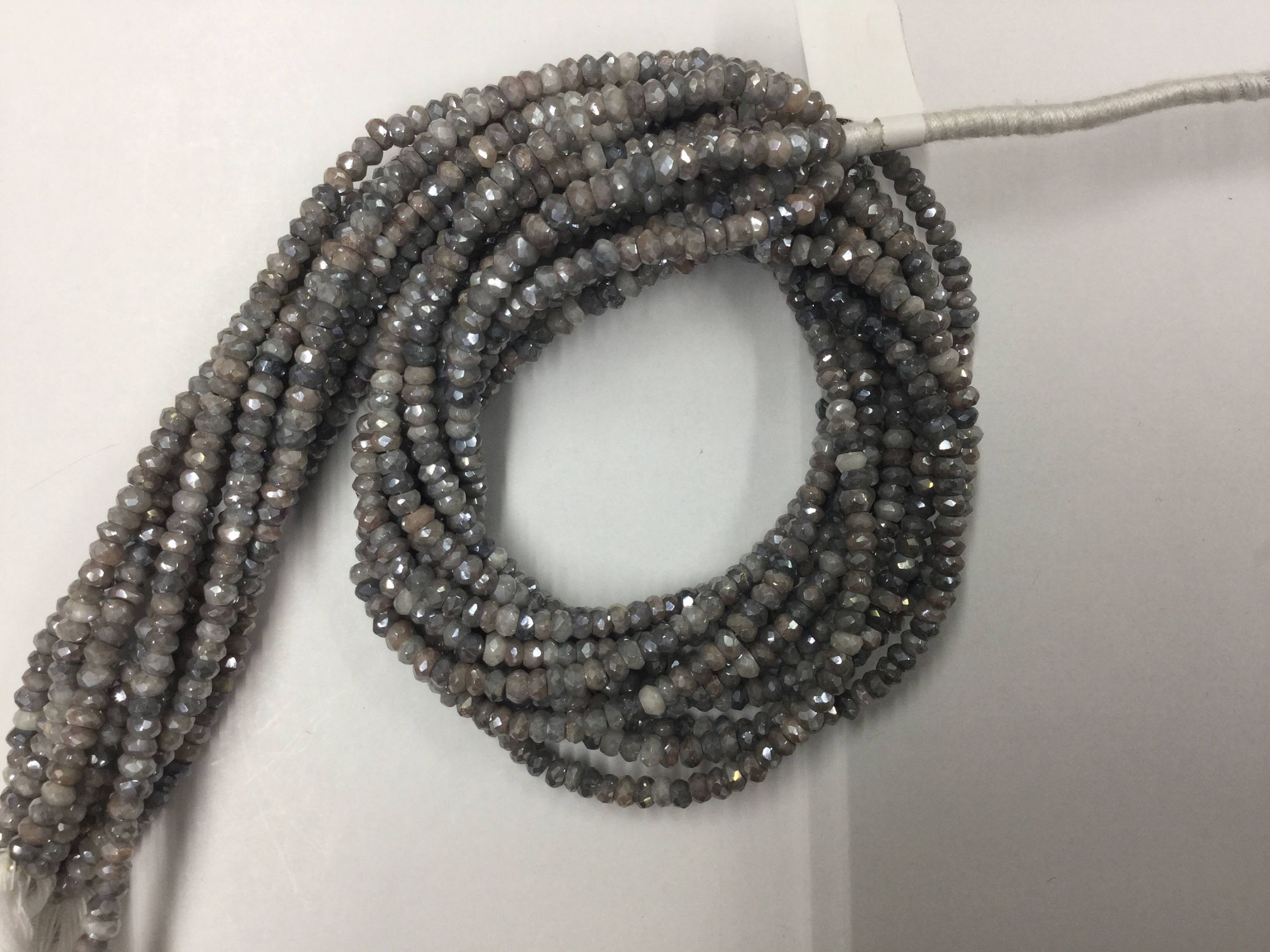 Silver Corundum Rondelles Faceted