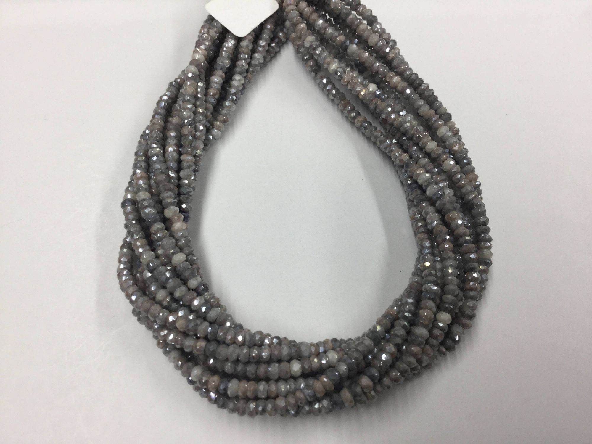 Silver Corundum Rondelles Faceted