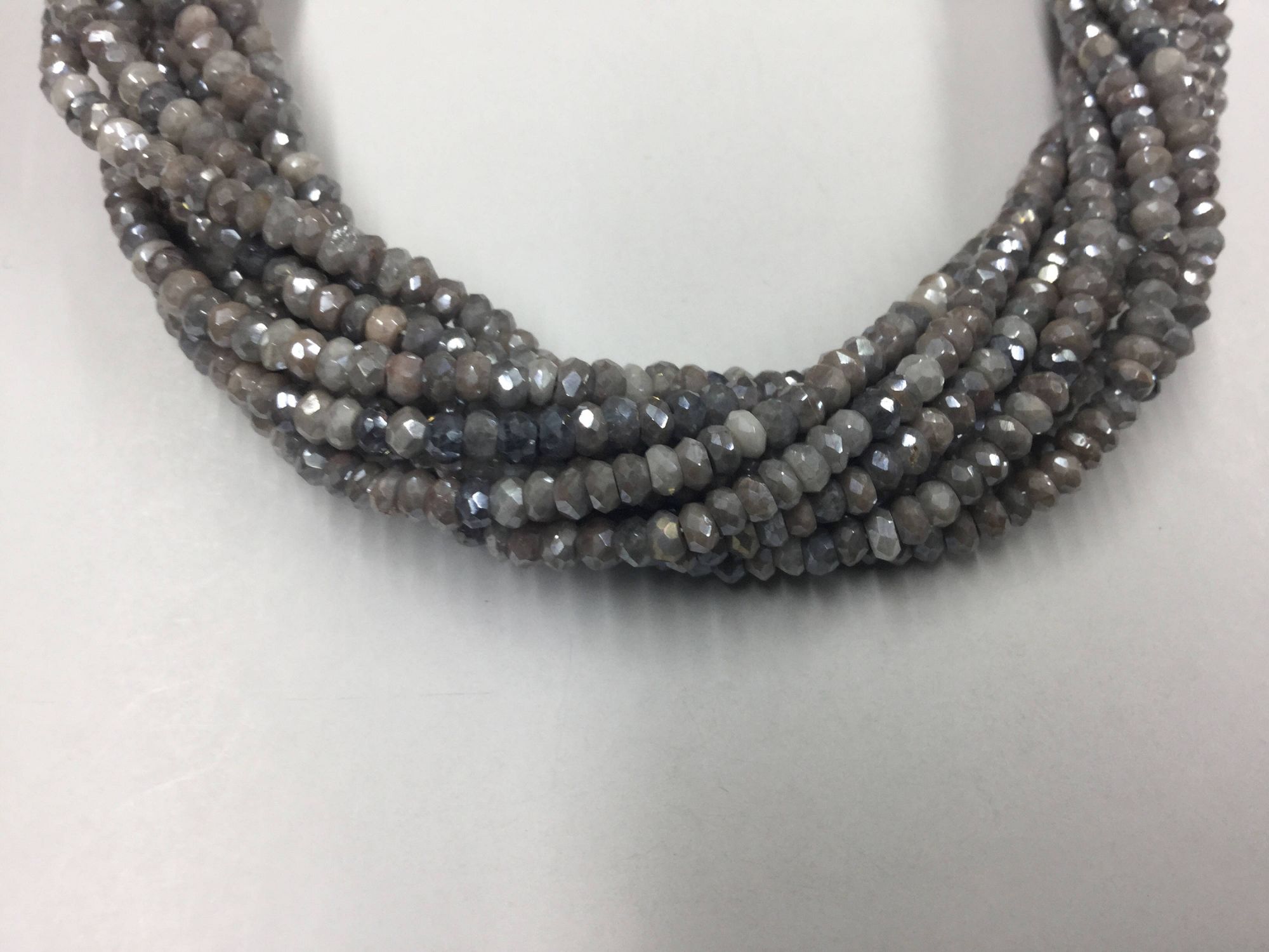 Silver Corundum Rondelles Faceted