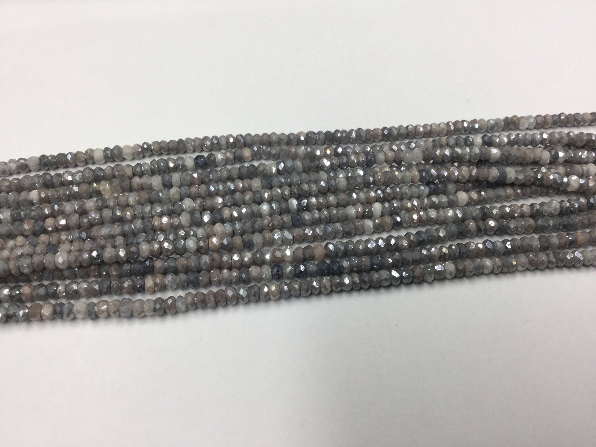 Silver Corundum Rondelles Faceted