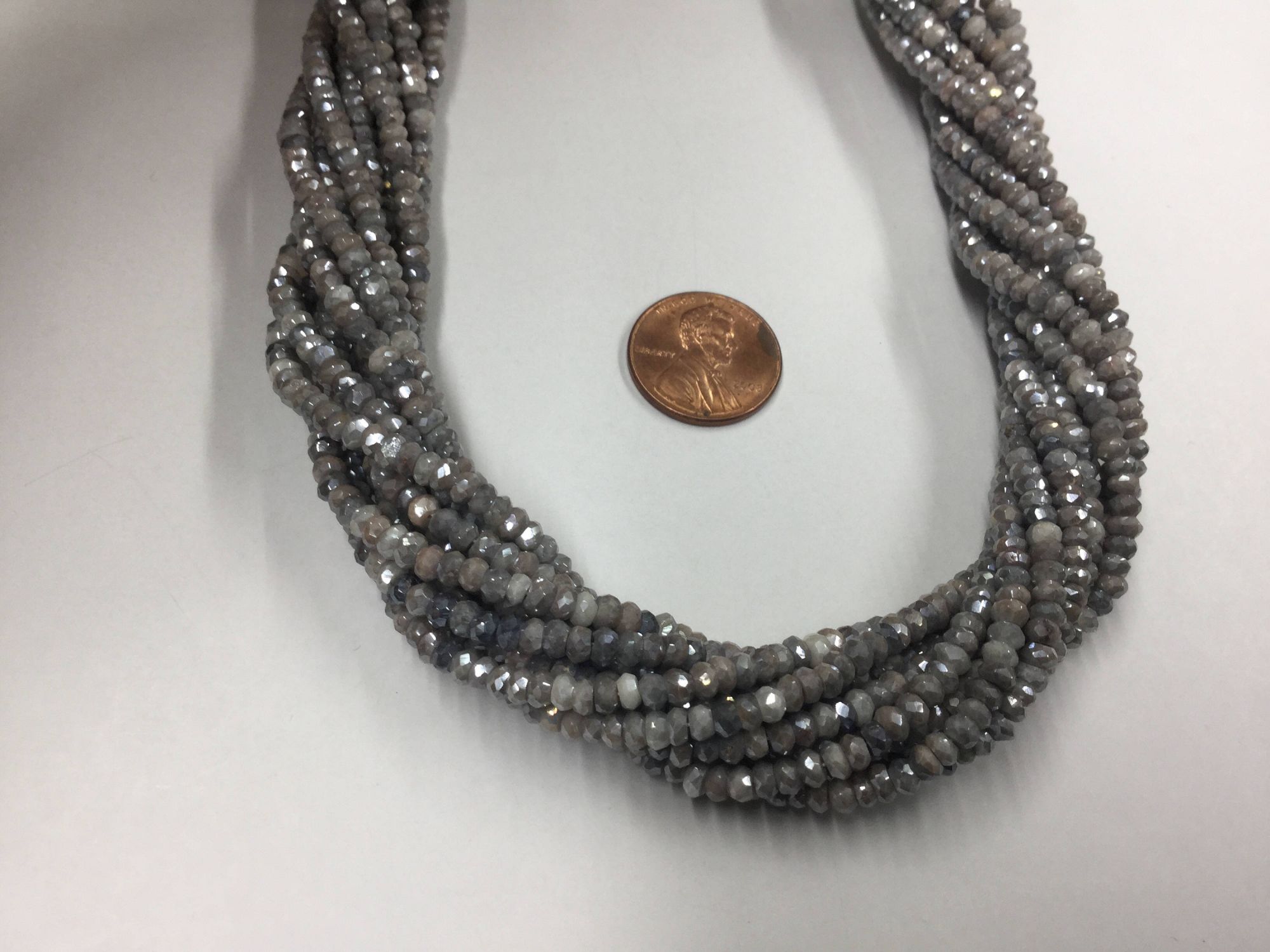 Silver Corundum Rondelles Faceted