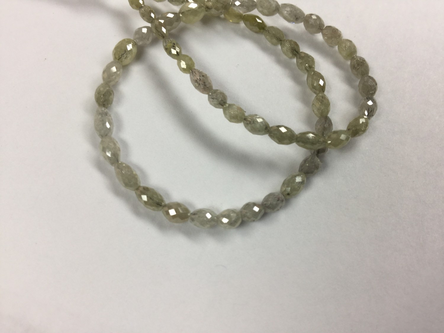 White/Yellow Diamond Rounded Ovals Faceted