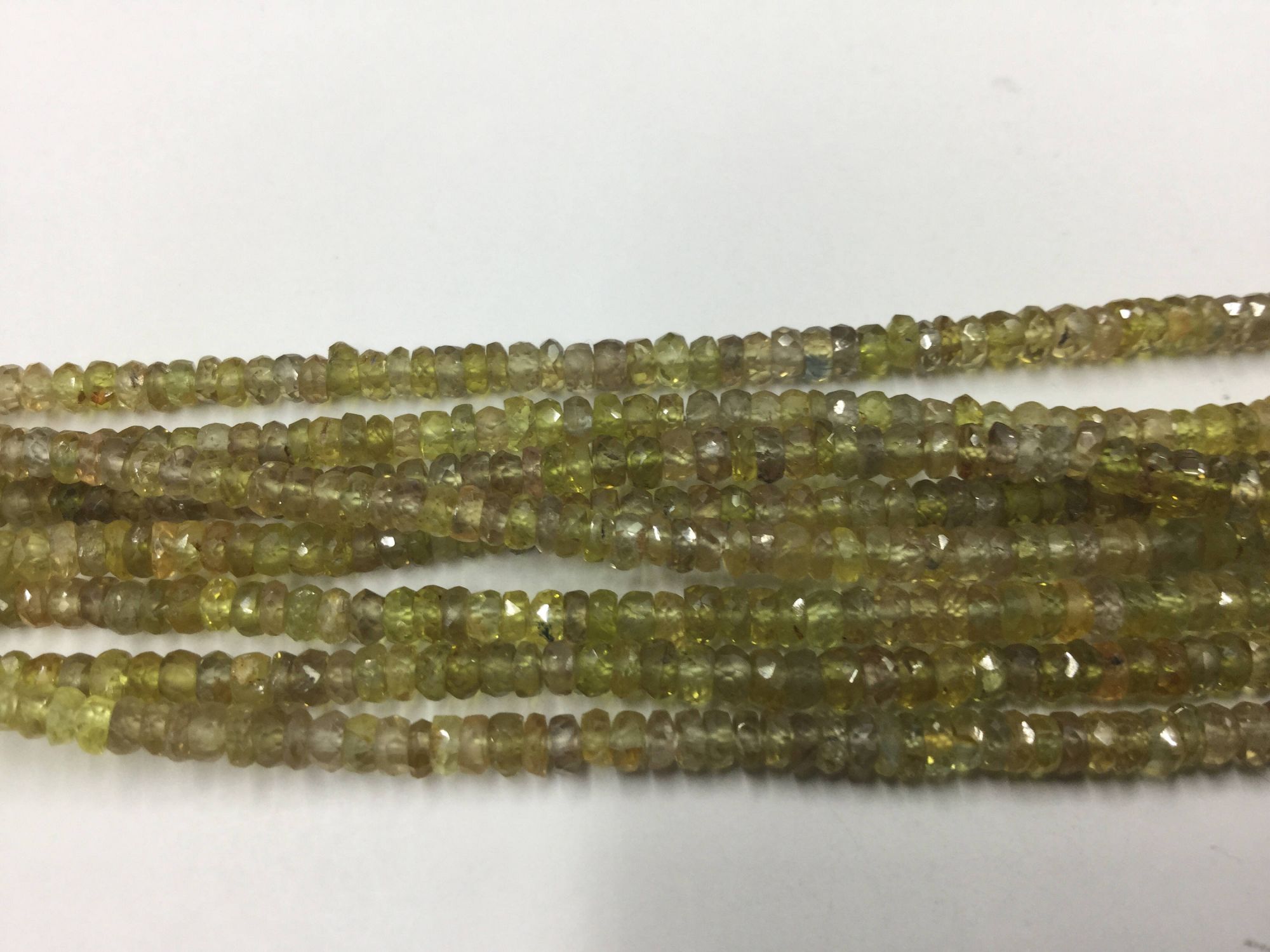 Yellowish Green Sapphire Rondelles Faceted